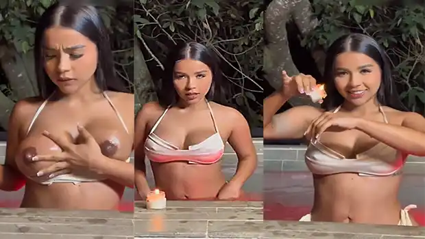Tetona Angi Lorena en la piscina se mete un consolador en su coño